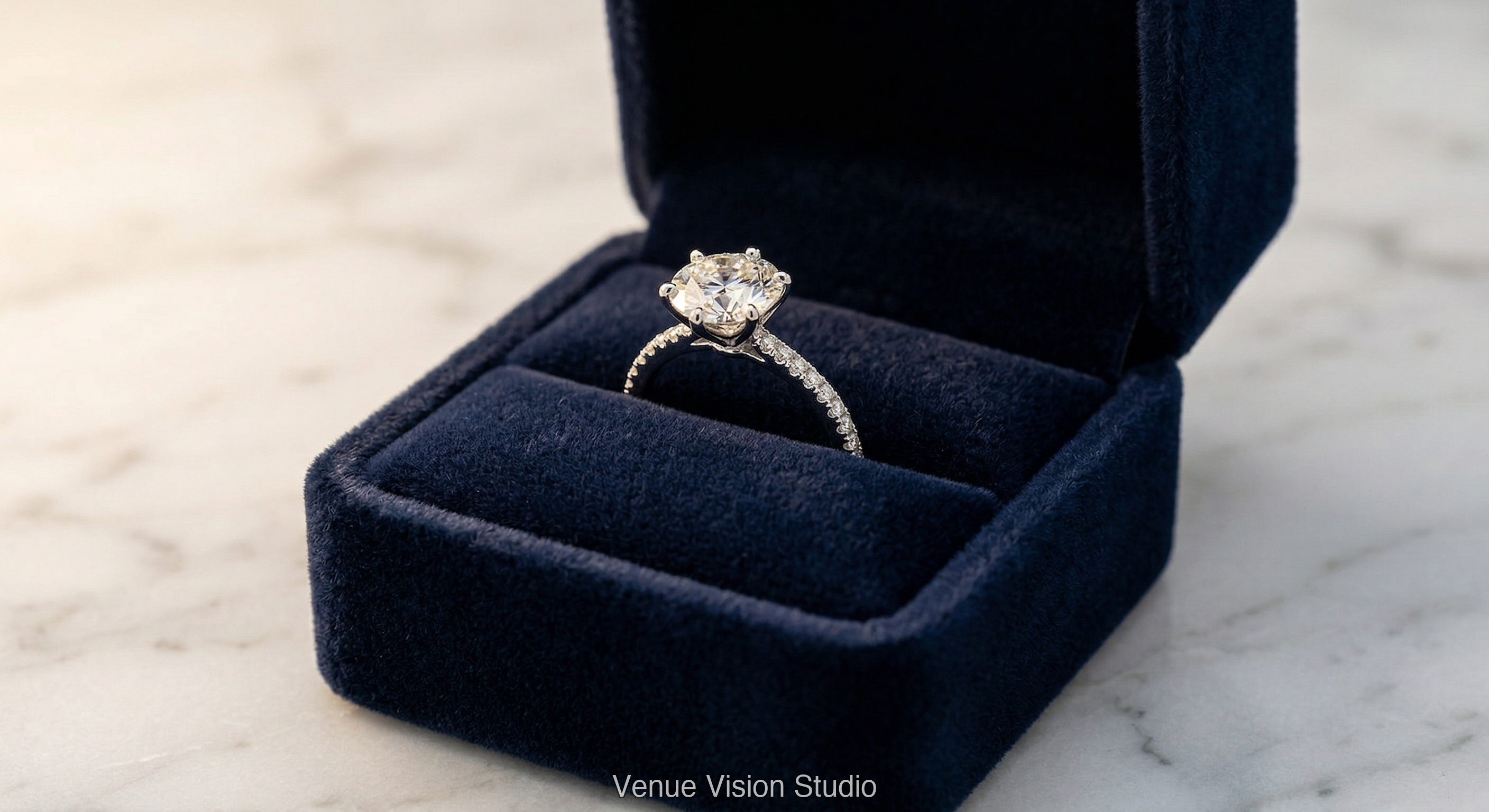 Diamond ring in navy velvet ring box
