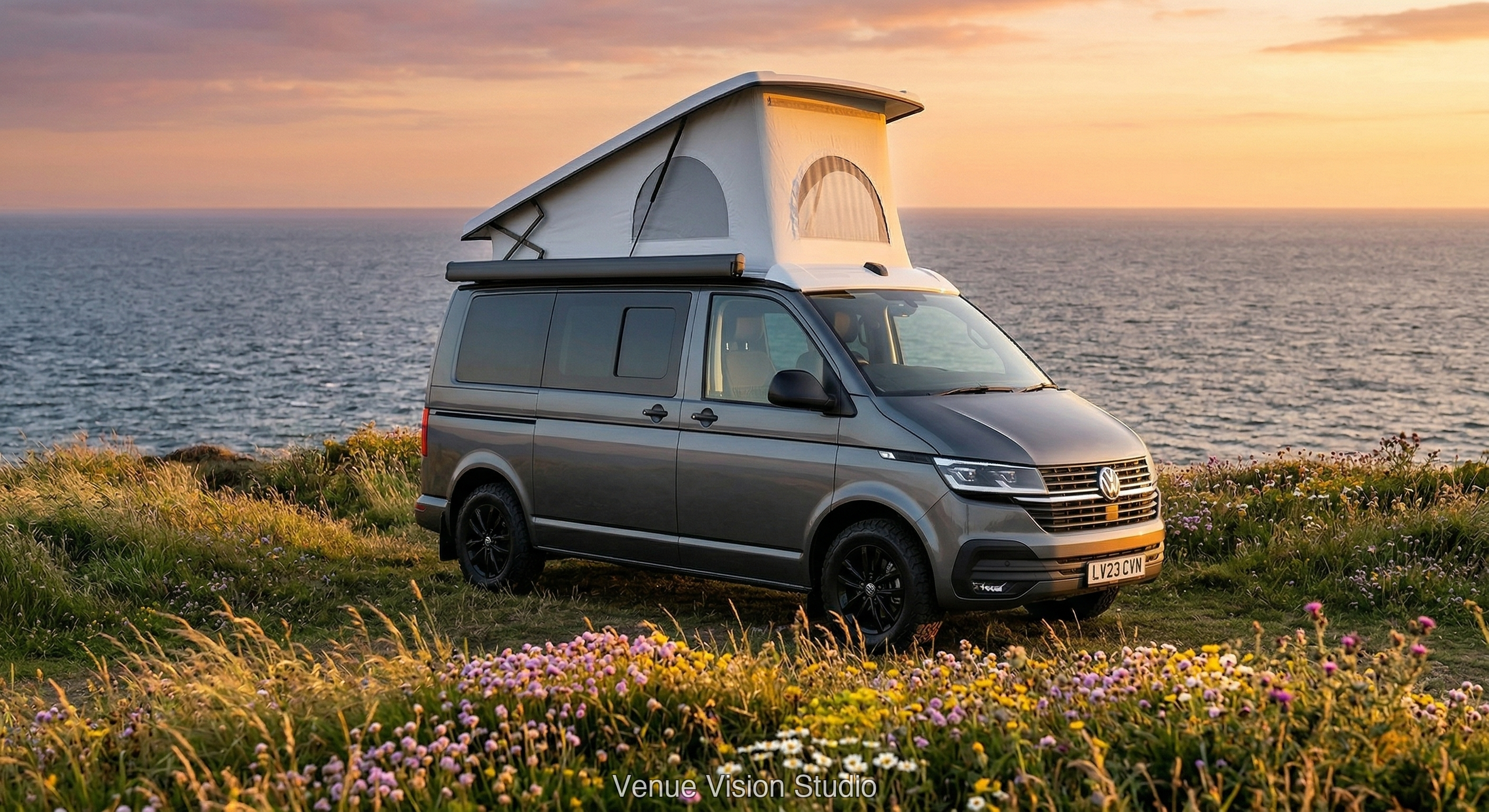 Campervan on coastal clifftop at golden hour