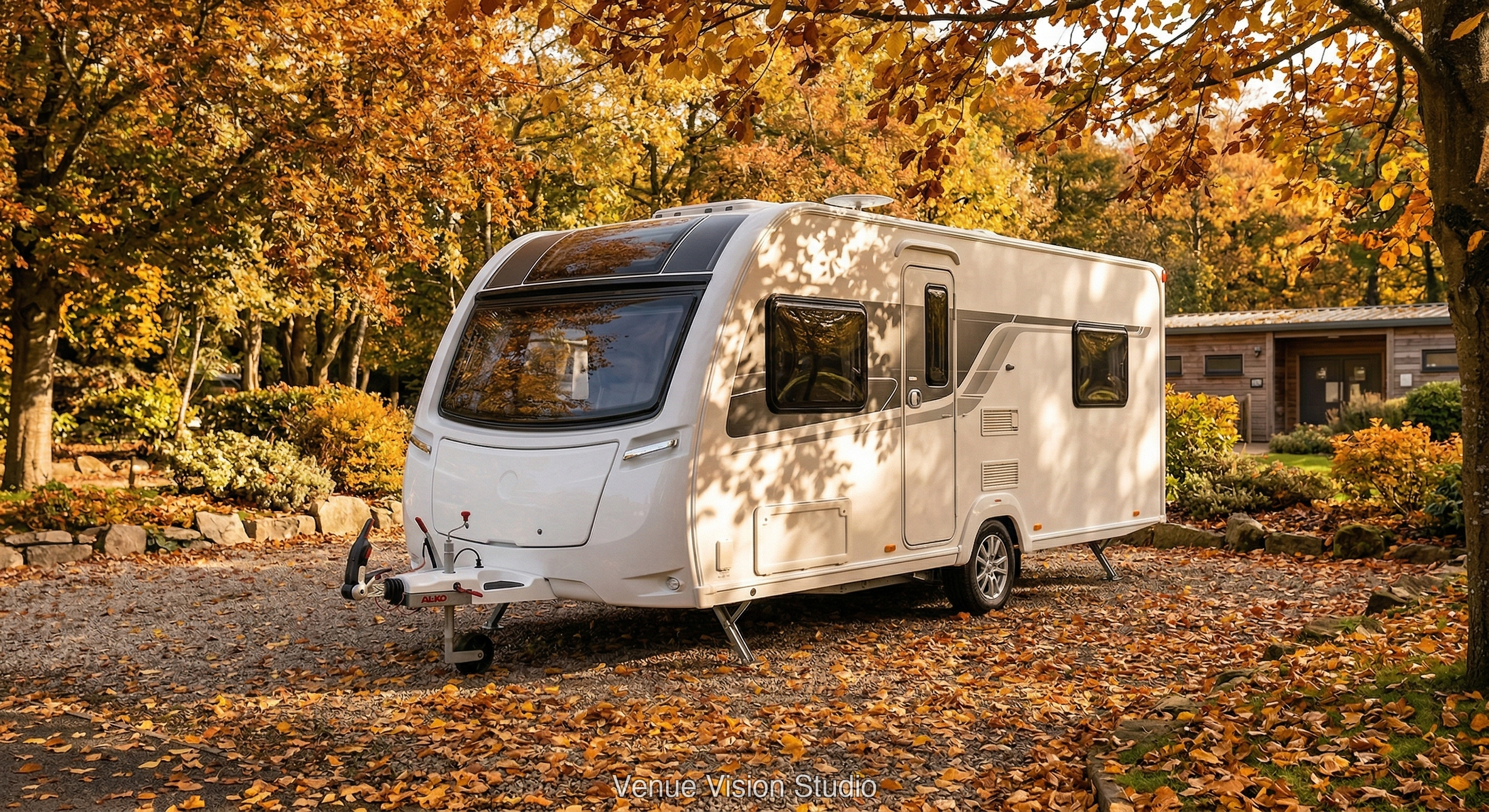 Caravan under golden autumn trees