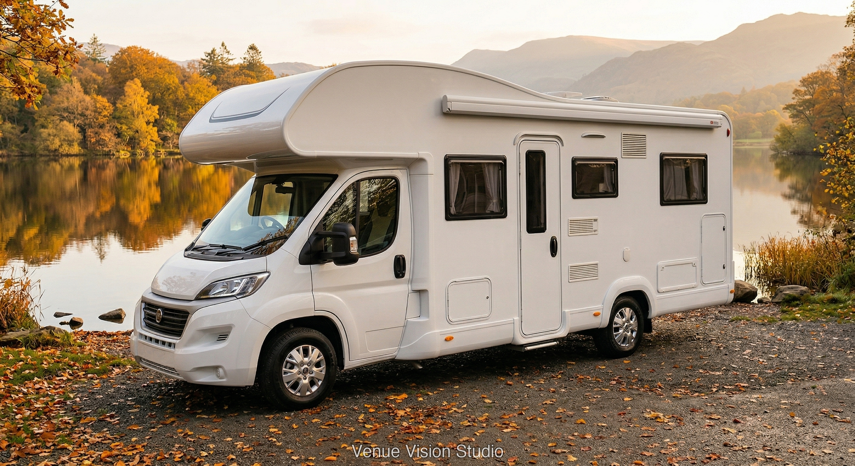 Motorhome beside an autumn lake